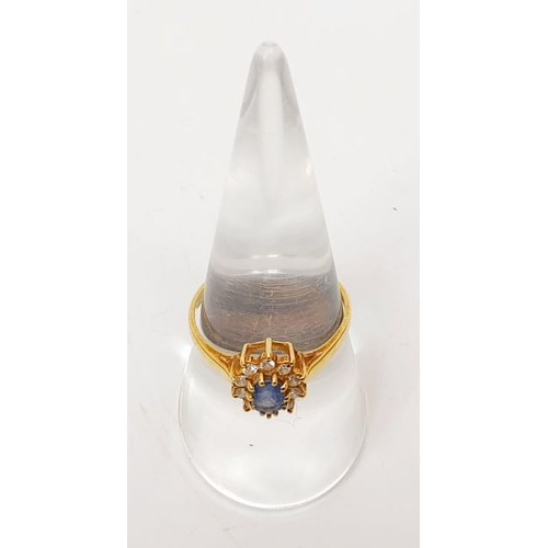 22 - A hallmarked 18ct gold sapphire and diamond cluster ring, size Q, gross weight 2.4g. UK shipping £14... 