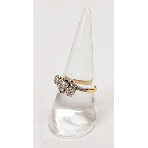 23 - An 18ct gold and platinum three diamond ring in illusion settings, size Q, weight 2.8g. UK shipping ... 