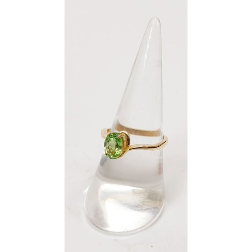 26 - A hallmarked 9ct gold ring set with tsavorite, size N/O, gross weight 2.1g. UK shipping £14.