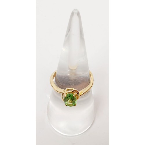 26 - A hallmarked 9ct gold ring set with tsavorite, size N/O, gross weight 2.1g. UK shipping £14.