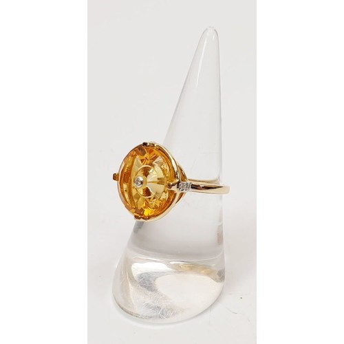 36 - A hallmarked 9ct gold ring set with citrine and diamond, size N/O, gross weight 4.5g. UK shipping £1... 