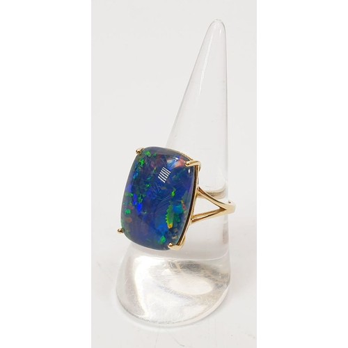 55 - A hallmarked 9ct gold opal triplet ring, size P/Q, gross weight 5.1g. UK shipping £14.