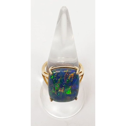 55 - A hallmarked 9ct gold opal triplet ring, size P/Q, gross weight 5.1g. UK shipping £14.