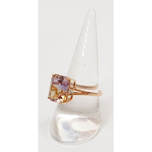 7 - A 9ct rose gold ring set with ametrine and zircon, size Q, gross weight 3.2g. UK shipping £14.