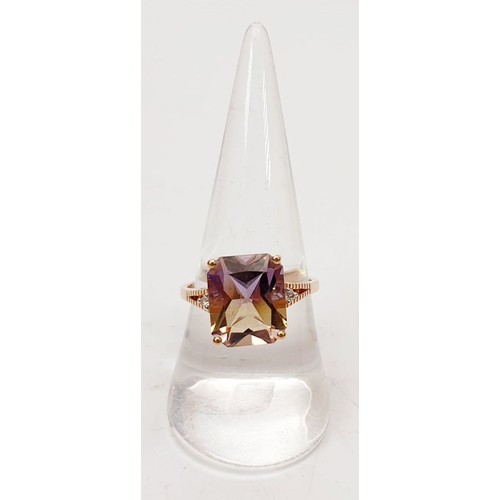 7 - A 9ct rose gold ring set with ametrine and zircon, size Q, gross weight 3.2g. UK shipping £14.