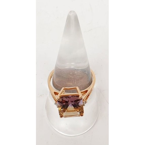 7 - A 9ct rose gold ring set with ametrine and zircon, size Q, gross weight 3.2g. UK shipping £14.