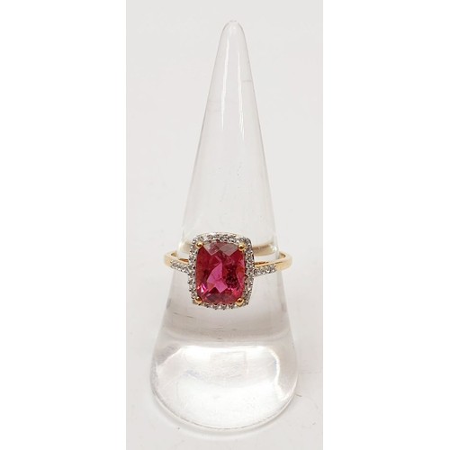 13 - A hallmarked 9ct gold ring set with rubellite and white zircon, size Q, gross weight 2.4g. UK shippi... 