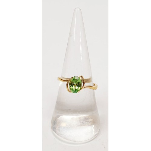 14 - A hallmarked 9ct gold ring set with tsavorite, size N/O, gross weight 2.1g. UK shipping £14.