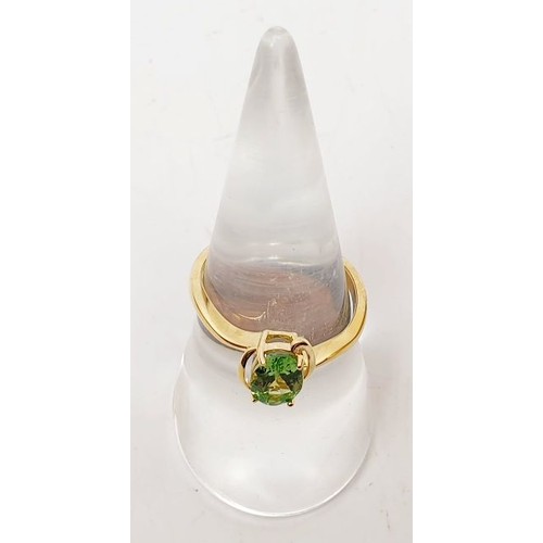 14 - A hallmarked 9ct gold ring set with tsavorite, size N/O, gross weight 2.1g. UK shipping £14.