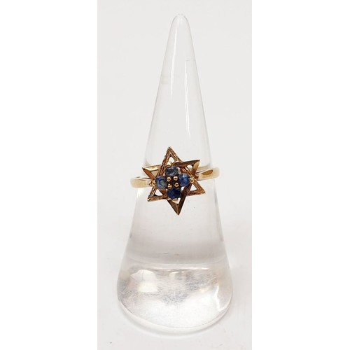 23 - A 1970s hallmarked 9ct gold ring set with sapphires, size L, gross weight 2.4g. UK shipping £14.