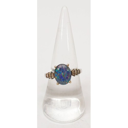 32 - A 925 silver ring with platinum overlay set with bolder opal and diamond, size P/Q. UK shipping £14.