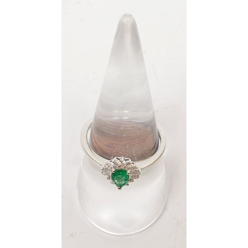 33 - A 925 silver ring with platinum overlay set with emerald and zircon, size P/Q. UK shipping £14.