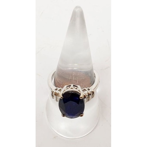 34 - A 925 silver ring with platinum overlay set with Masoala sapphire and diamond, size P/Q. UK shipping... 