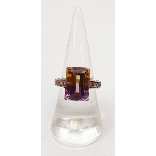 36 - A 925 silver ring set with ametrine and amethyst, size N/O. UK shipping £14.