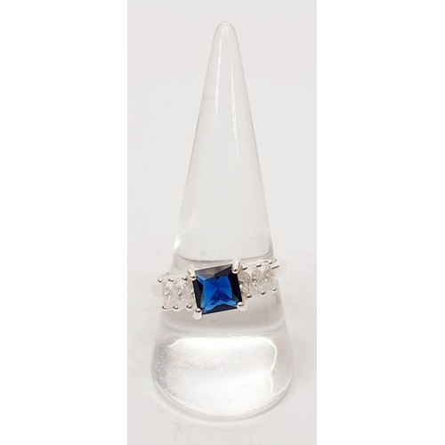 41 - A 925 silver ring set with blue and white stones, size U. UK shipping £14.