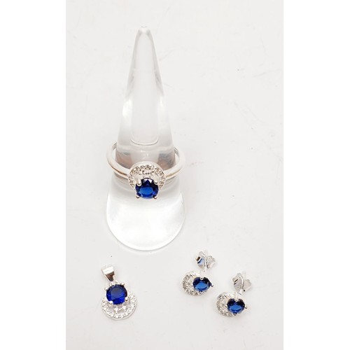 48 - 925 silver earrings, pendant and ring set with blue and white stones. UK shipping £14.