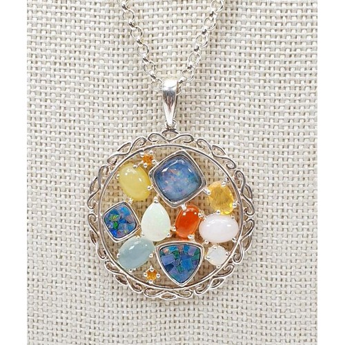 55 - A silver pendant set with multi coloured gem stones and chain, gross weight 11g. UK shipping £14.