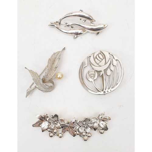 60 - Four silver brooches, gross weight 28g. UK shipping £14.