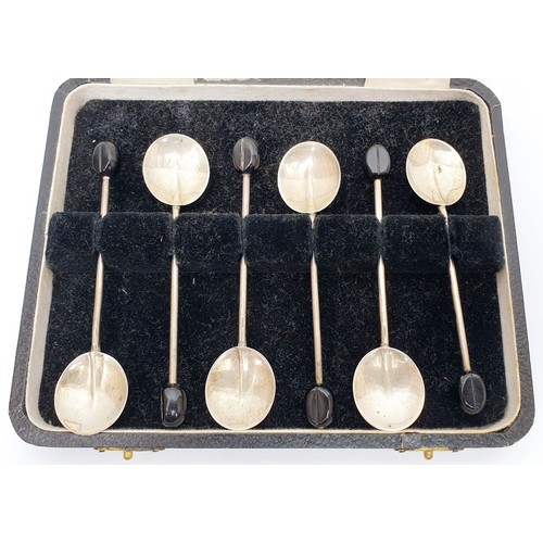 69 - A cased set of silver hallmarked coffee spoons, Birmingham 1933, gross weight 37g. UK shipping £14.