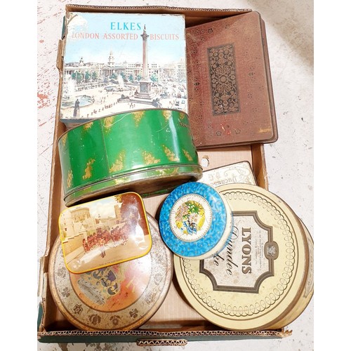 107 - A box of tins. UK shipping £14.