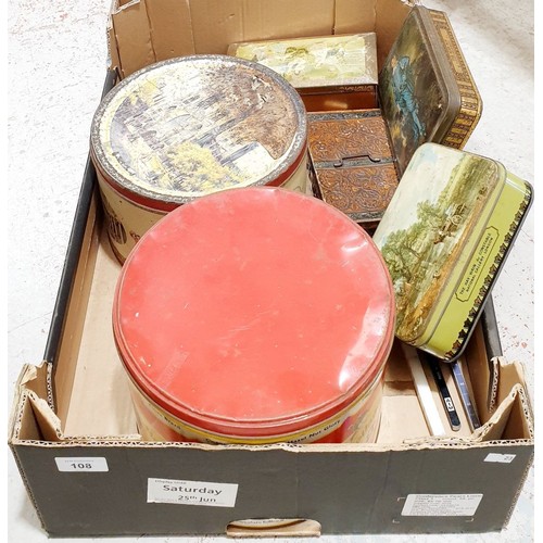 108 - A box of tins. UK shipping £14.