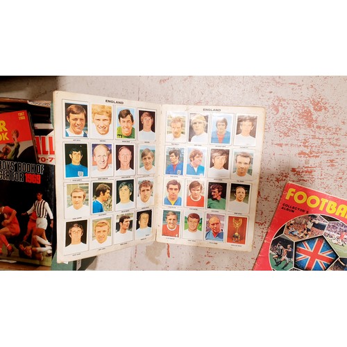 179 - A Mexico 70 football sticker album which is complete, a Panini football 78 sticker album and three f... 