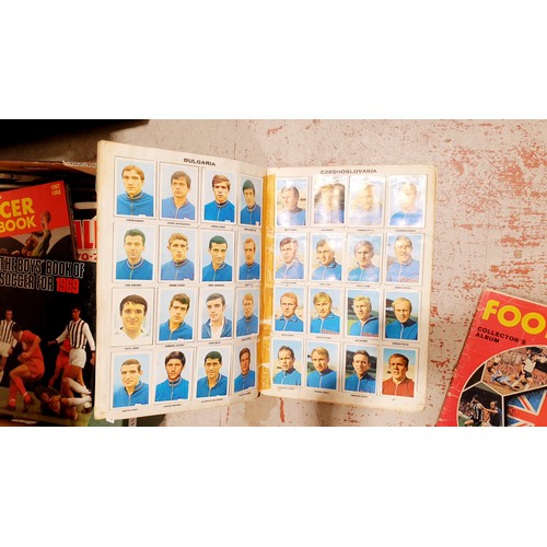 179 - A Mexico 70 football sticker album which is complete, a Panini football 78 sticker album and three f... 