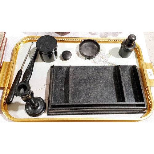 182 - Vintage ebony dressing table items and an ebony medicine bottle holder together with a wooden tray. ... 