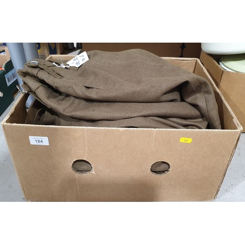 184 - A box of military clothing. UK shipping £14.