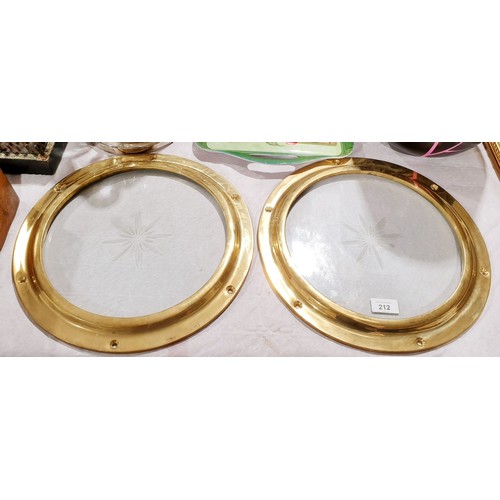 212 - Two brass portholes and glass, diameter 14