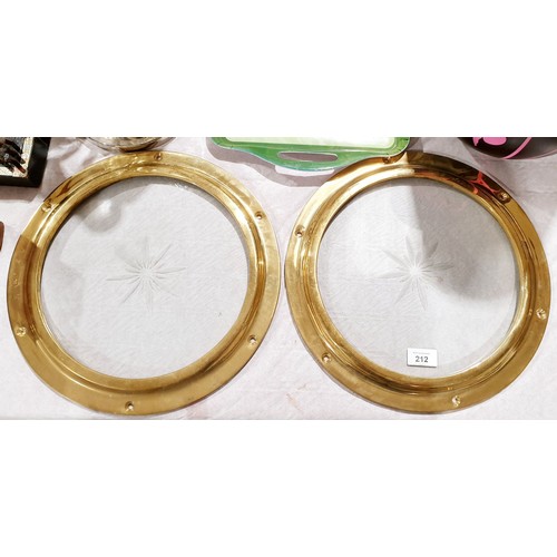 212 - Two brass portholes and glass, diameter 14