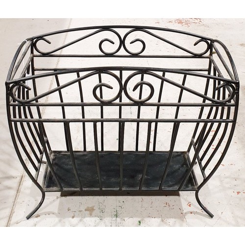 219 - A wrought iron magazine rack. No shipping. Arrange collection or your own packer and shipper, please... 