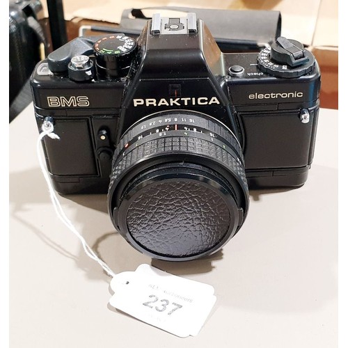 237 - A Praktica BMS camera with a 50mm lens and case. UK shipping £14.