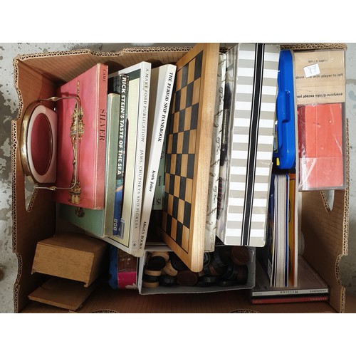 297 - A box of games and books. No shipping. Arrange collection or your own packer and shipper, please. El... 