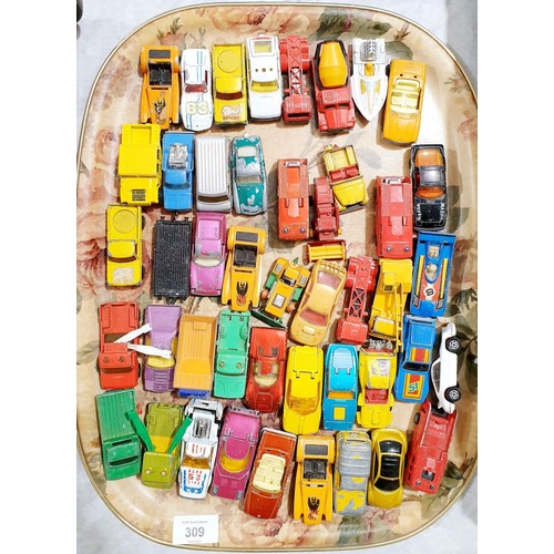 309 - A selection of toy cars. UK shipping £14.