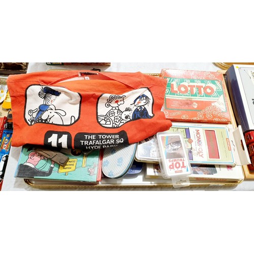 313 - A vintage tidy bag, annuals and games including Top Trumps. No shipping. Arrange collection or your ... 