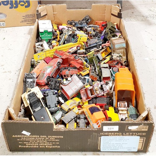 321 - A box of toy vehicles. UK shipping £14.