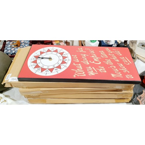 324 - Four new in box wall clocks, 17.75