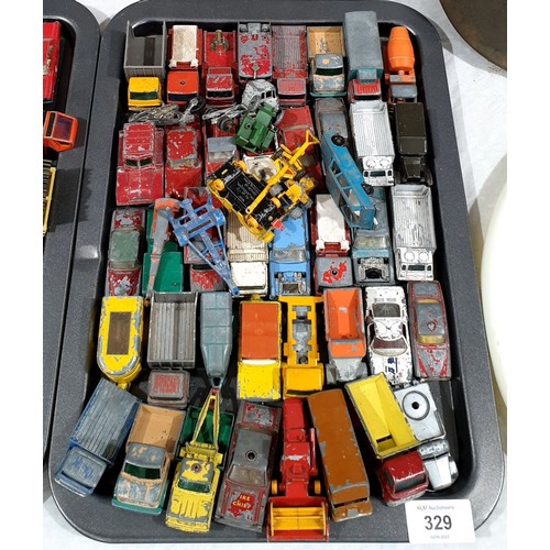 329 - A selection of toy vehicles. UK shipping £14.