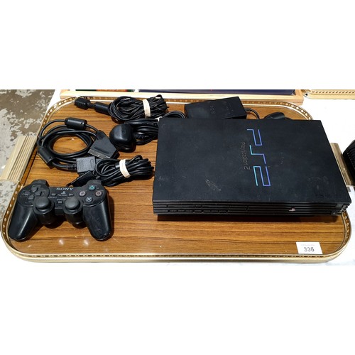 336 - A Playstation 2 and one controller. Electricals are sold as scrap. UK shipping £14.