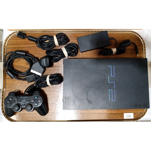 336 - A Playstation 2 and one controller. Electricals are sold as scrap. UK shipping £14.