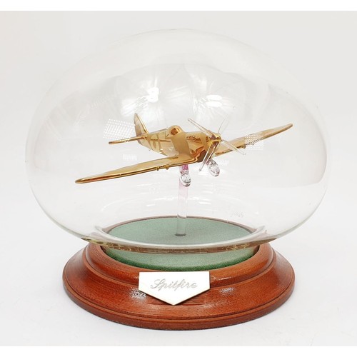 347 - A Nothumbrian Glass model of a Spitfire in a dome, height 5.5