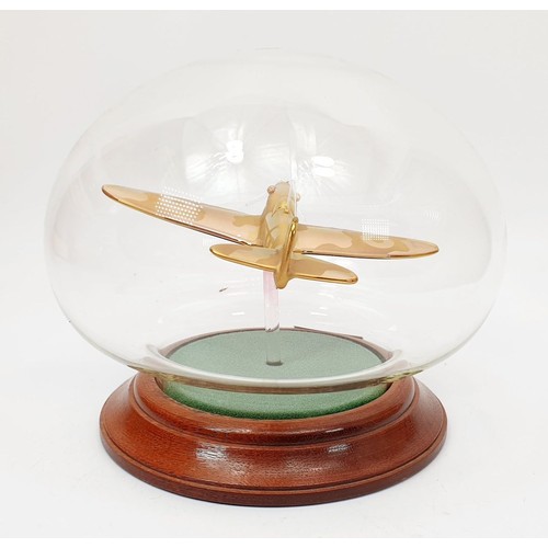 347 - A Nothumbrian Glass model of a Spitfire in a dome, height 5.5