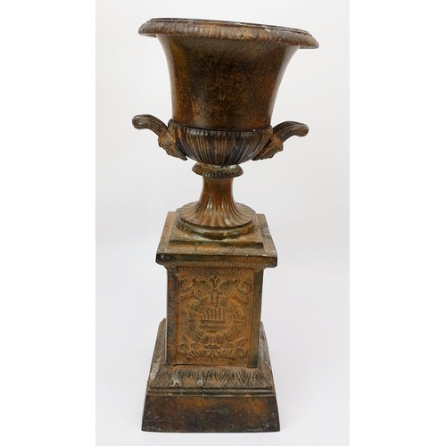 349 - A brass vase on a classical base, height 13.25