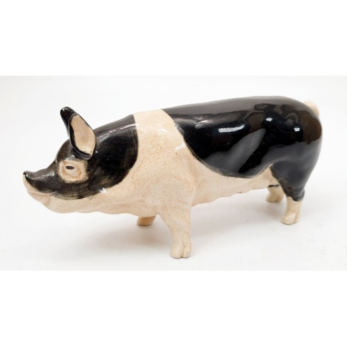 351 - An Excalibur ceramic model of a pig, length 6.5