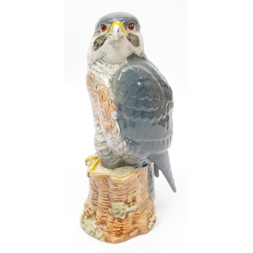 353 - Royal Doulton for Whyte and Mackay, a decanter in the form of a peregrine falcon modelled by John G.... 