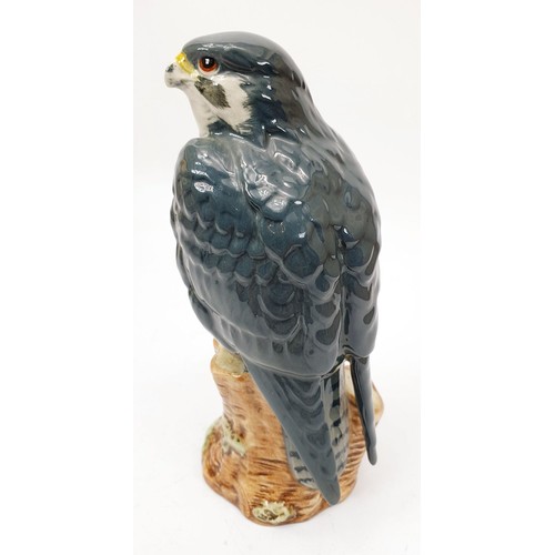 353 - Royal Doulton for Whyte and Mackay, a decanter in the form of a peregrine falcon modelled by John G.... 