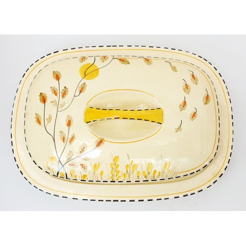 365 - A Crown Devon hand painted covered meat dish, width 10.75