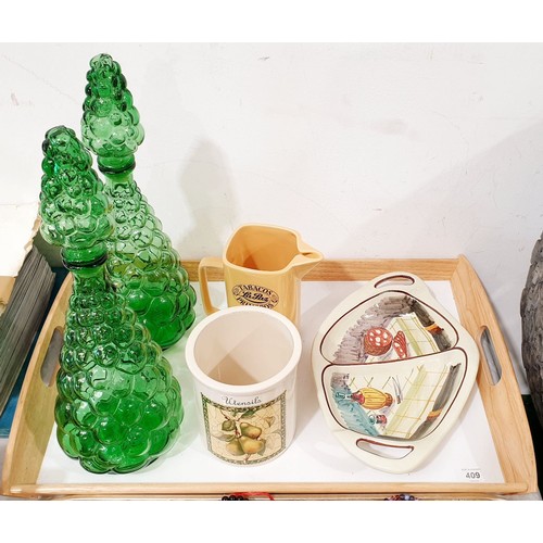 409 - A tray of glass and china including two green decanters. No shipping. Arrange collection or your own... 