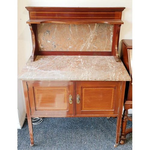 420 - An early 20th century marble top wash stand, width 36